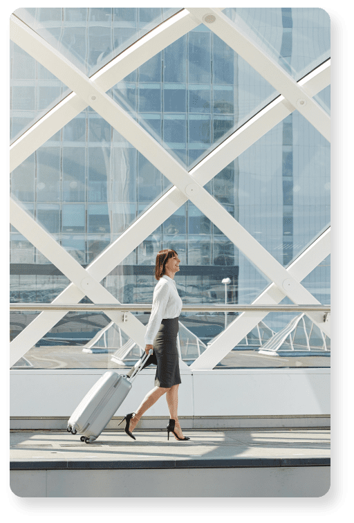 traveling-business-woman-walking-with-suitcase-in-2021-08-26-23-05-01-utc